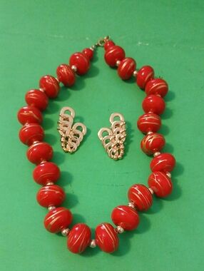 Red Beaded Statement Necklace With Gold Tone Clip Earrings.